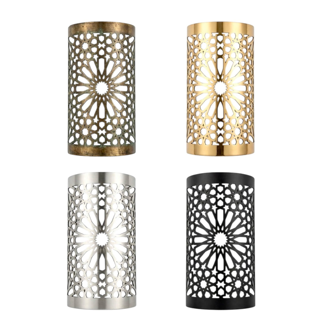 Traditional Moroccan brass wall sconce with star-shaped cutout patterns for boho and oriental interior decor.