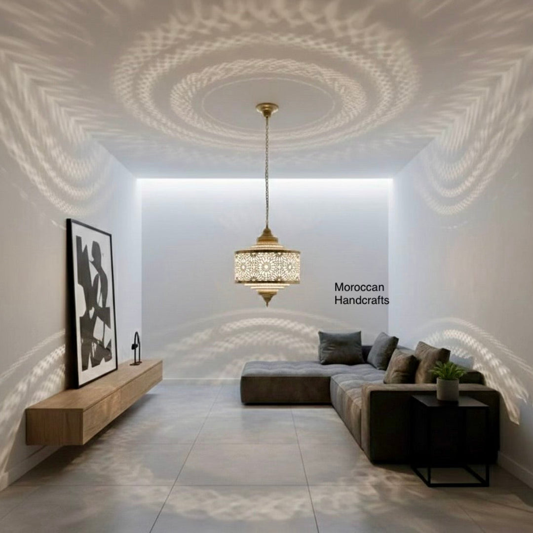 Warm glow from a Moroccan brass lantern with delicate perforations and a tiered dome shape.