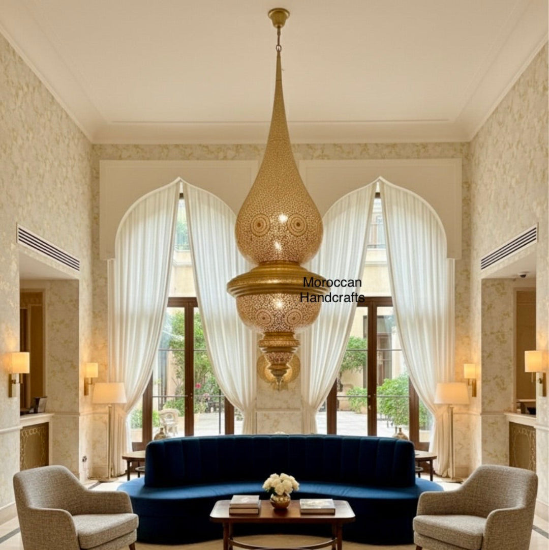 Gigantic Arabic-style brass lamp fixture dominating the center of a spacious cafe setting.
