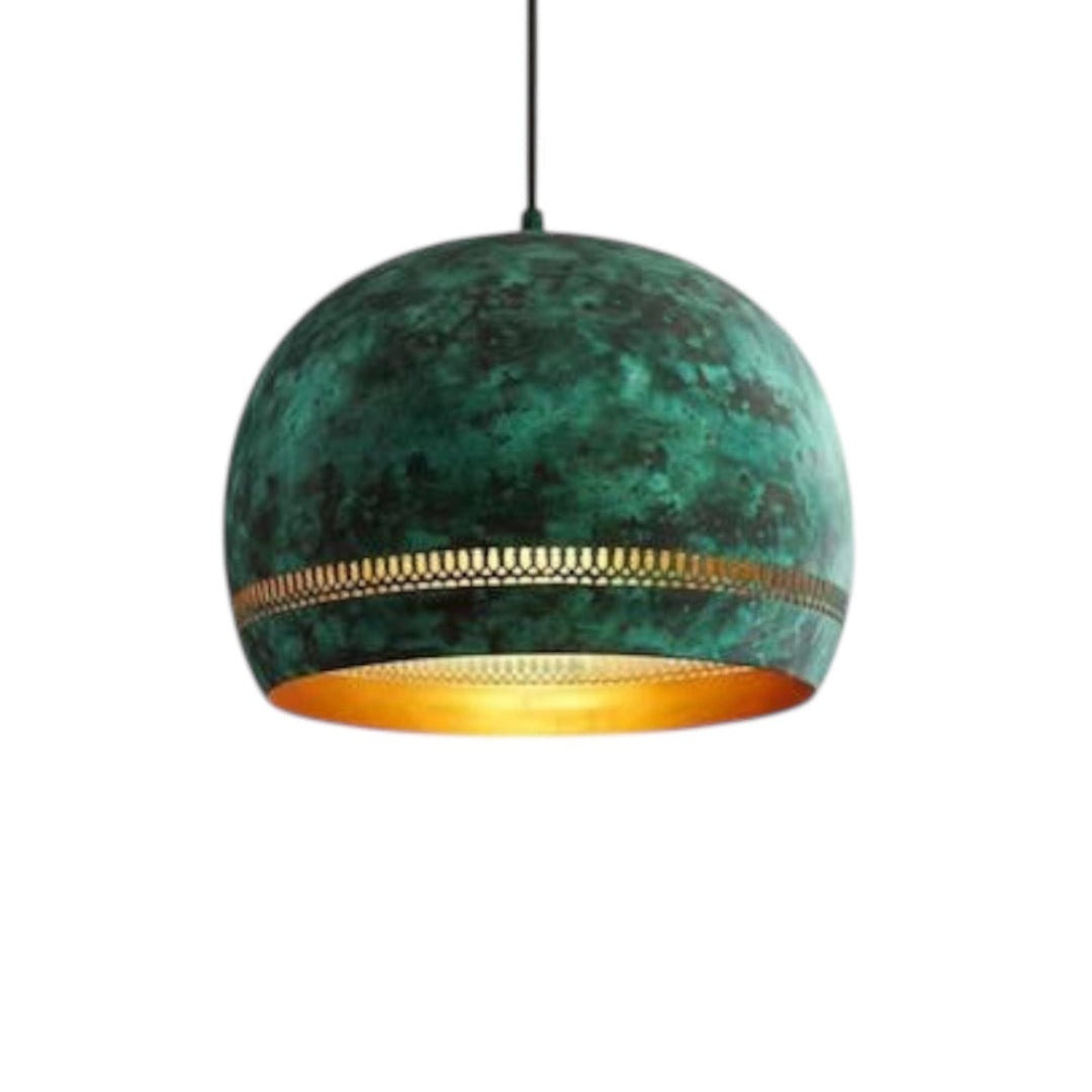 Tpatina green brass dome lamps hanging in a minimalist Moroccan handmade style farmhouse .