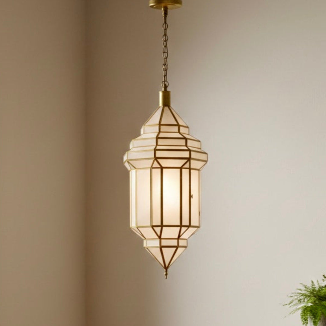 Moroccan artisan brass lamp creating intricate geometric light shadows in a cozy living room.