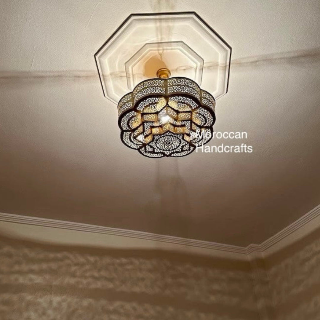 Authentic handmade Moroccan glass lantern with colorful patterns, perfect for ethnic home decor and outdoor lighting.