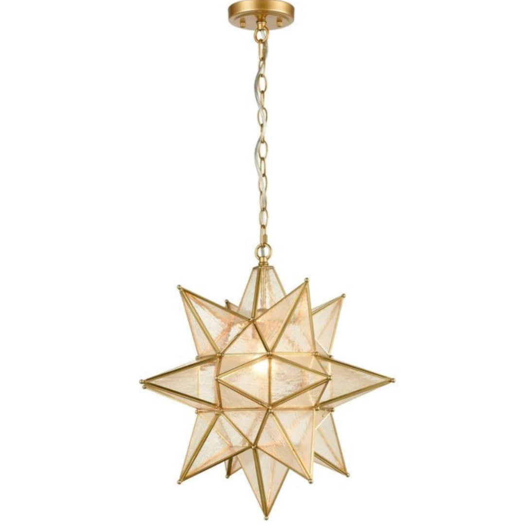 Handcrafted Moroccan star pendant light in aged brass with textured glass panels.