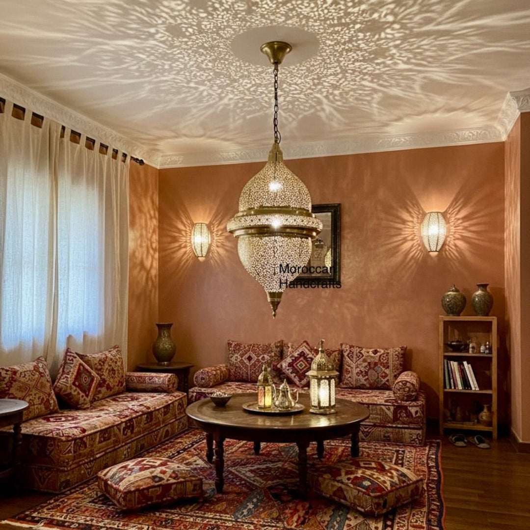  Luxury Moroccan brass pendant light installed in a bohemian style lounge with warm ambient lighting.