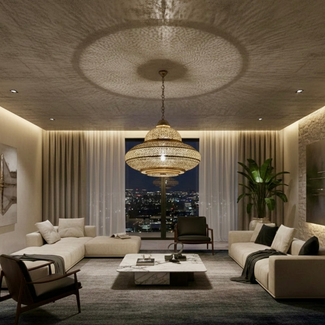 Artisanal Moroccan brass lamp centerpiece in a contemporary living room with large windows, showing detailed shadow play on a concrete-style ceiling.