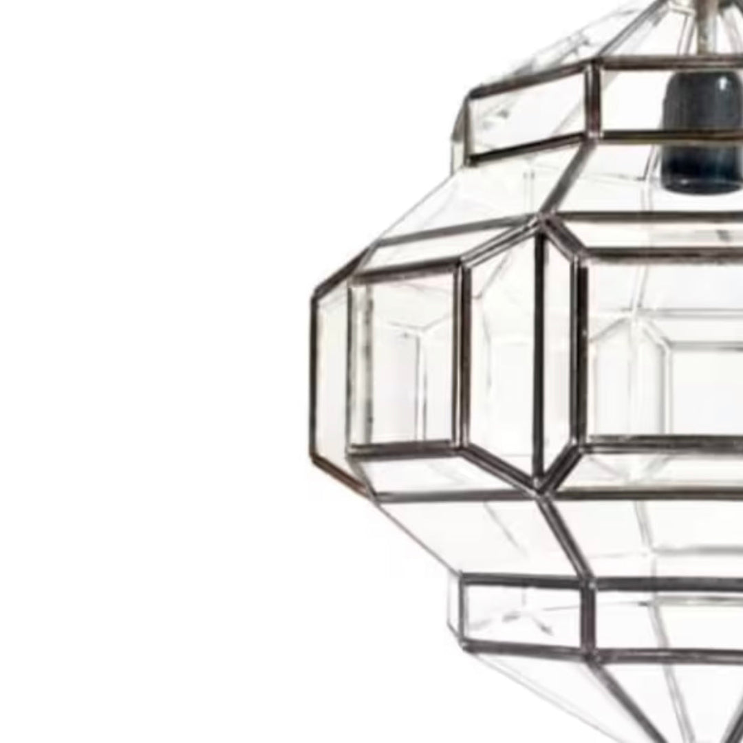 Close-up of hand-etched brass details on an authentic Moroccan hanging lantern