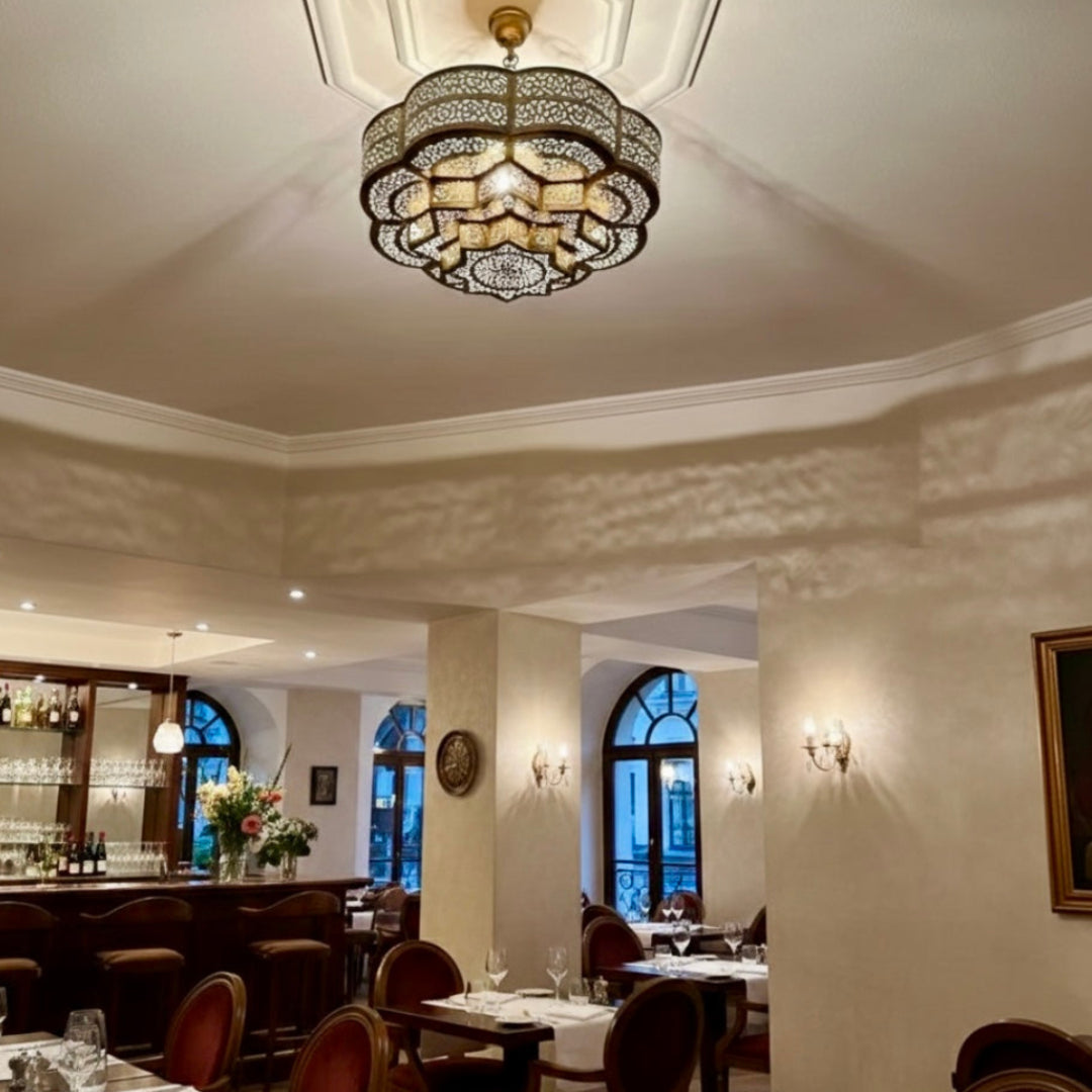 Large standing Moroccan floor lamp made of high-quality brass, providing a focal point for exotic and modern spaces.