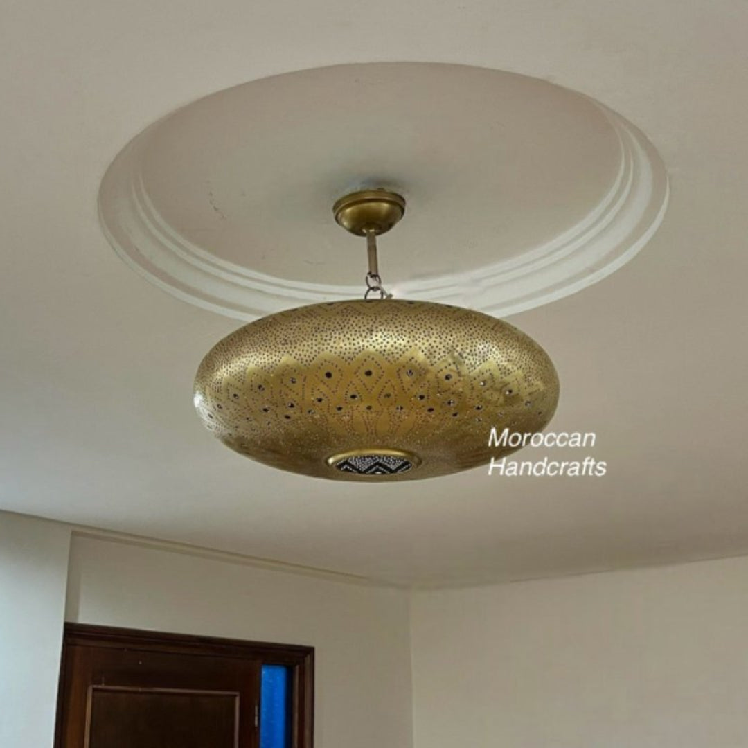  Authentic Moroccan brass hanging lamp with traditional hand-carved geometric designs.