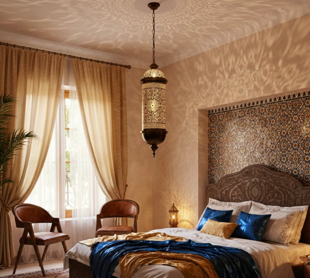  A cozy bedroom with a warm Moroccan theme, featuring a handcrafted brass pendant lamp casting beautiful patterns on the walls.