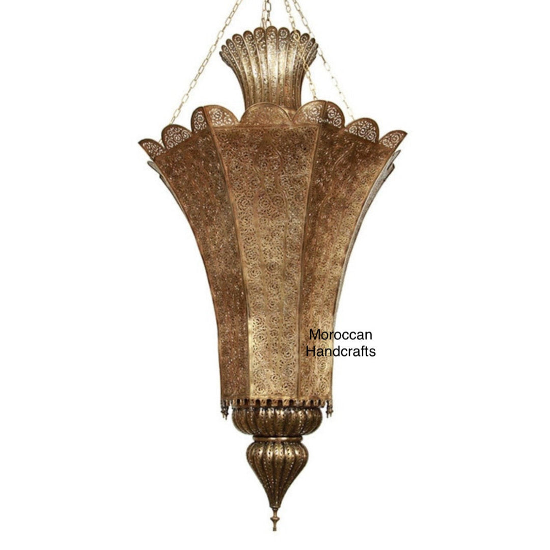 Artisanal Bohemian decor hanging lantern, showing the fine, hand-punched brass craftsmanship in a cozy setting.