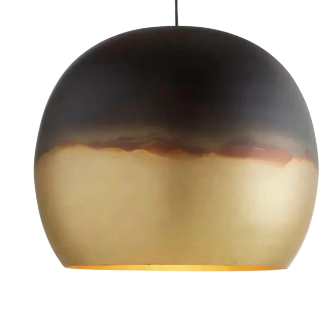 Contemporary kitchen featuring three Moroccan brass pendant lights with a city skyline view in the background.