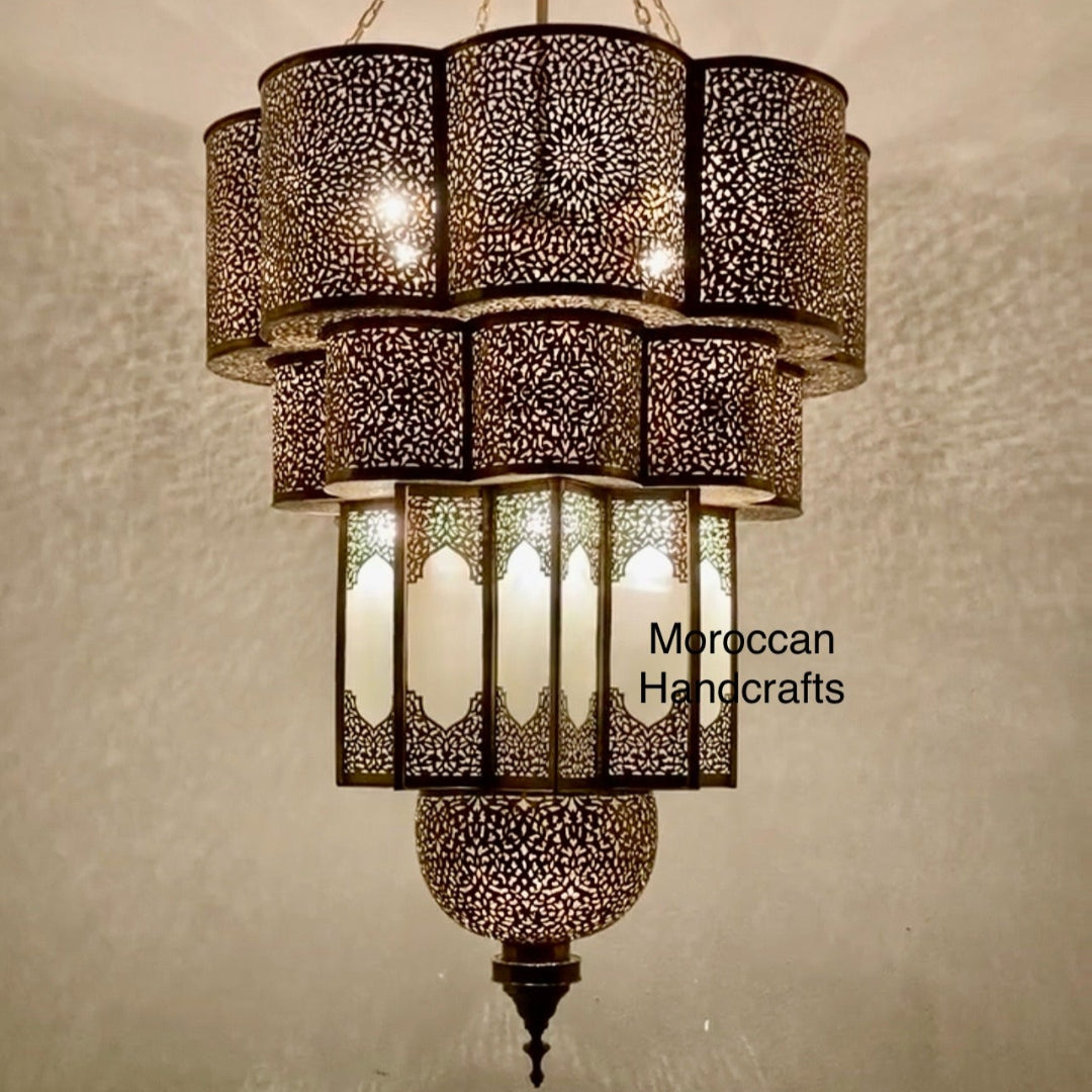Decorative metal lantern providing warm, filtered light in a contemporary interior design setting.
