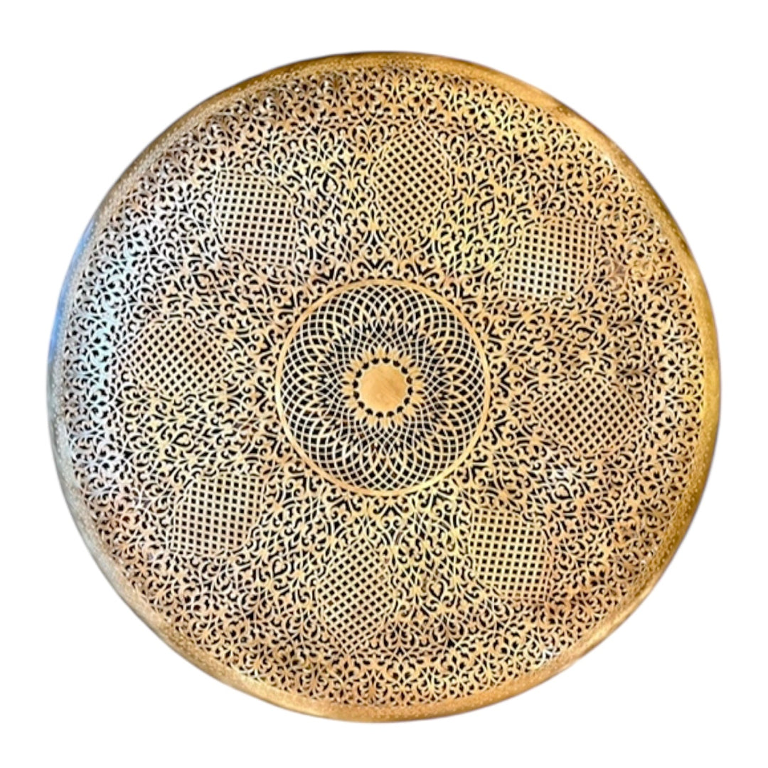 A stunning Moroccan-style brass wall lamp, ideal for bohemian or luxury home interior design.
