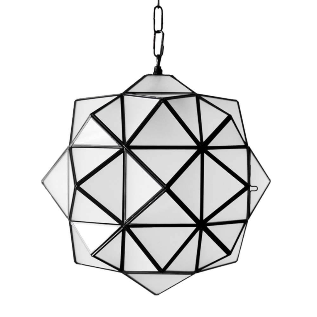 ⁠Handcrafted Moroccan geometric star brass pendant lamp with clear frosted glass shade and black brass frame isolated product view