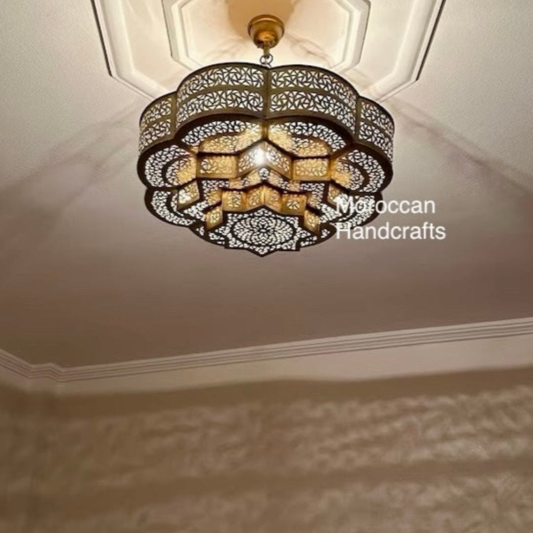  Handcrafted Moroccan brass pendant light with intricate geometric patterns, ideal for modern bohemian ceiling decor.