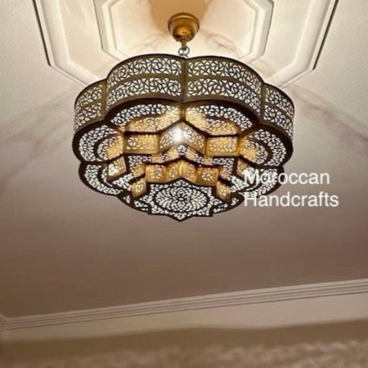  Handcrafted Moroccan brass pendant light with intricate geometric patterns, ideal for modern bohemian ceiling decor.