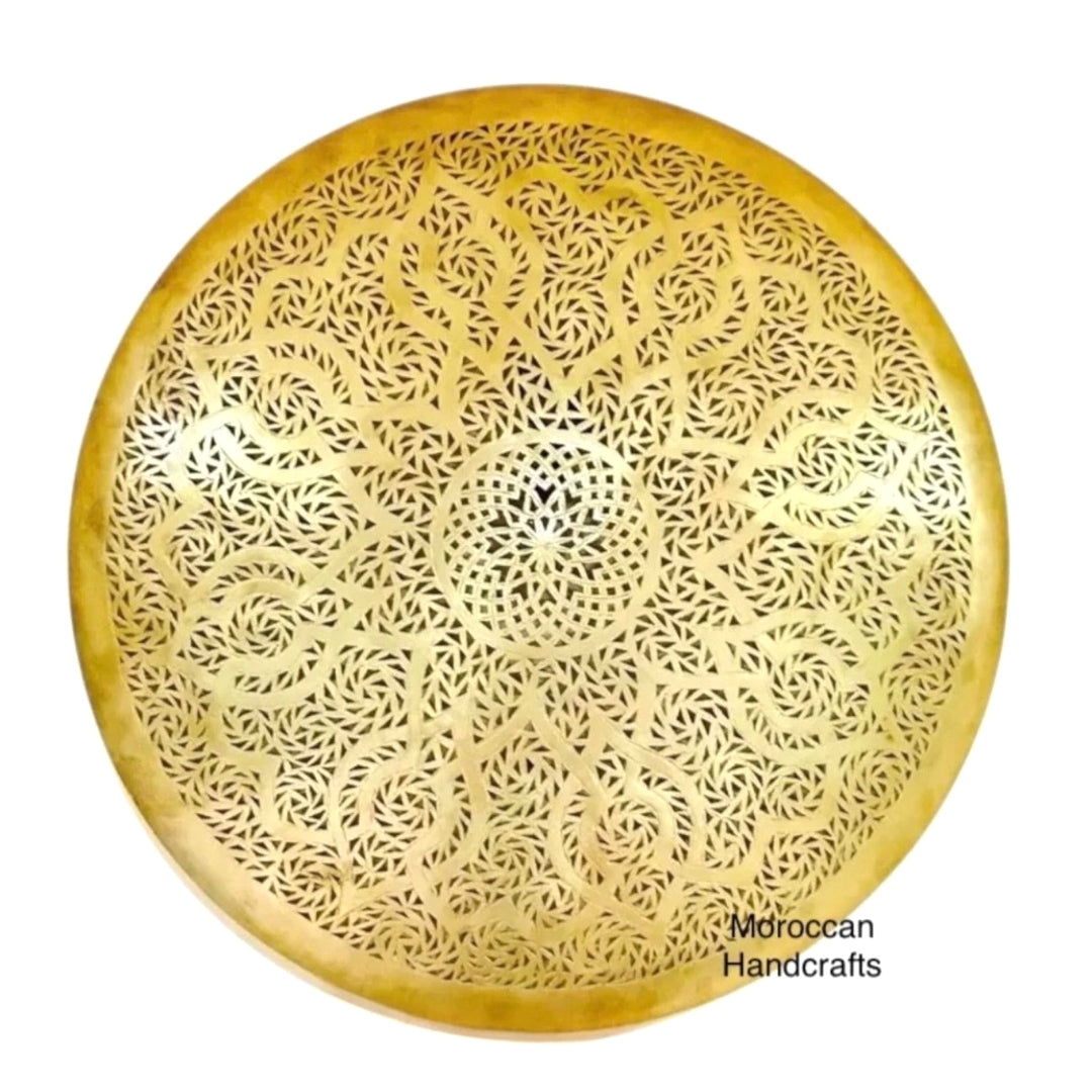  ⁠Round handmade Moroccan wall lamp in polished gold brass showing intricate geometric cutouts, unlit on a white background.⁠
