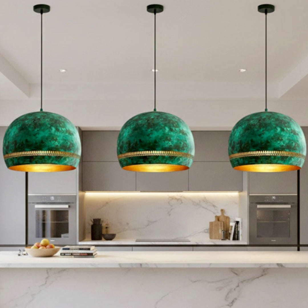 Detailed view of a handmade dome pendant lamp in distressed with patina green terior.