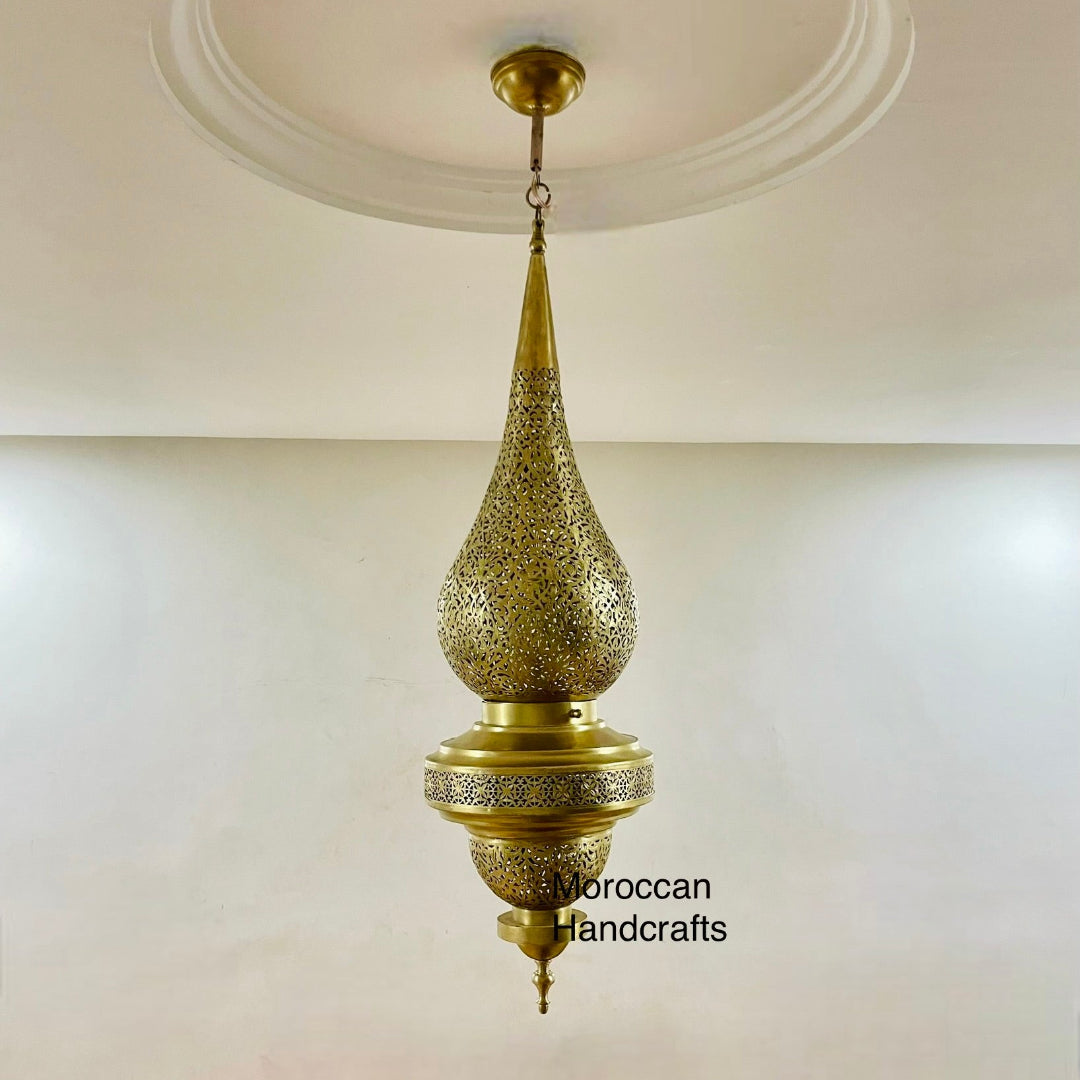 Artisan-made metal pendant light fixture in the Moroccan style, featuring a detailed lower globe section.