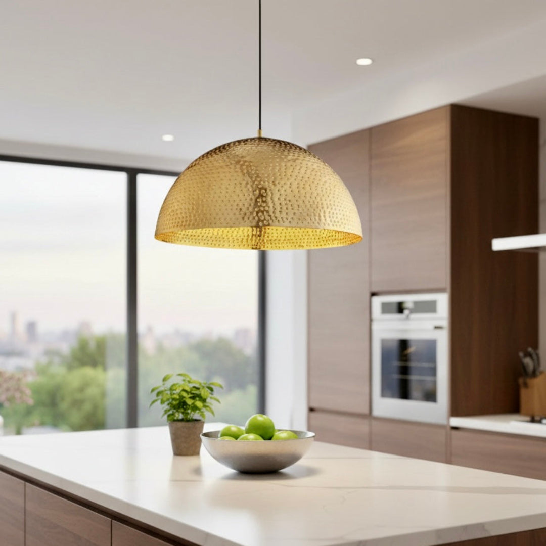  Luxury Moroccan brass pendant light hanging in a bright modern kitchen with white marble countertops and city view window.