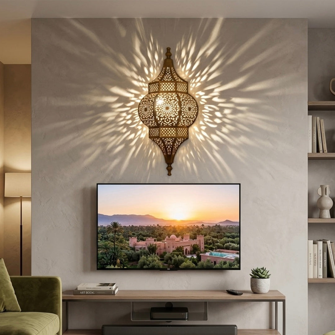 Contemporary living room interior featuring a handcrafted Moroccan brass wall lamp mounted above a TV console, blending traditional craft with modern decor