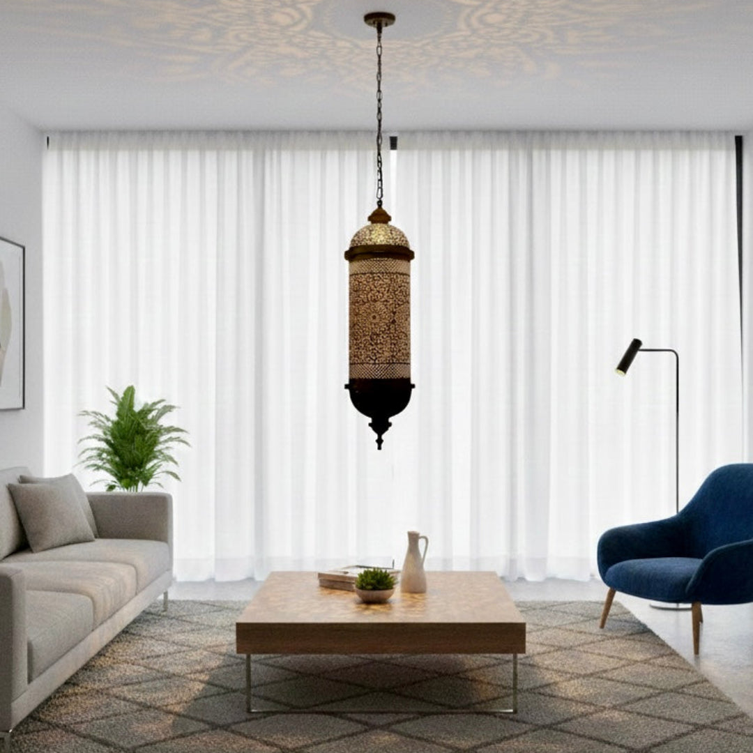  A contemporary living room featuring a handcrafted brass Moroccan hanging lamp creating decorative shadows on the ceiling.