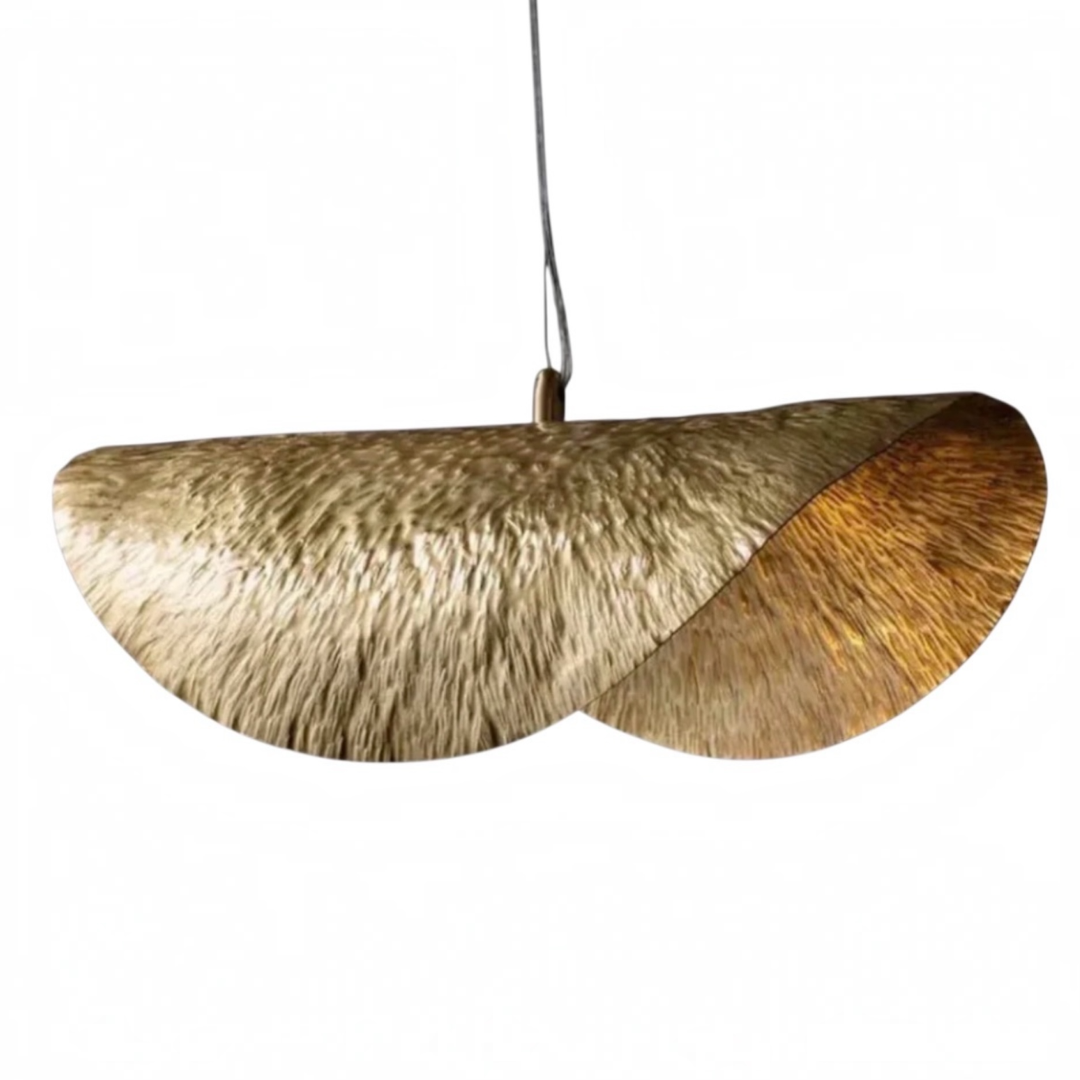 Handmade modern Moroccan brass pendant light featuring a curved wave design with a textured hammered finish isolated on a clean background