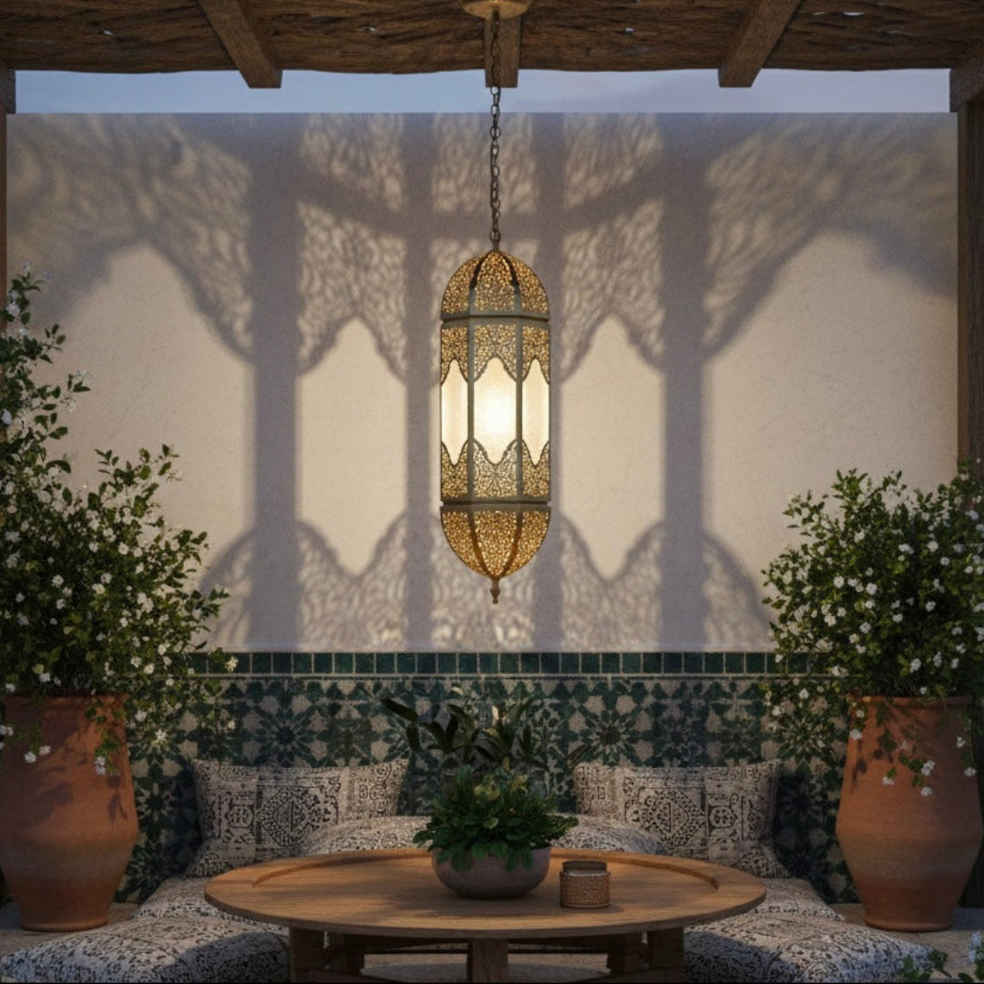 Elegant brass Moroccan ceiling lamp illuminating a dining area with artistic light shadows.