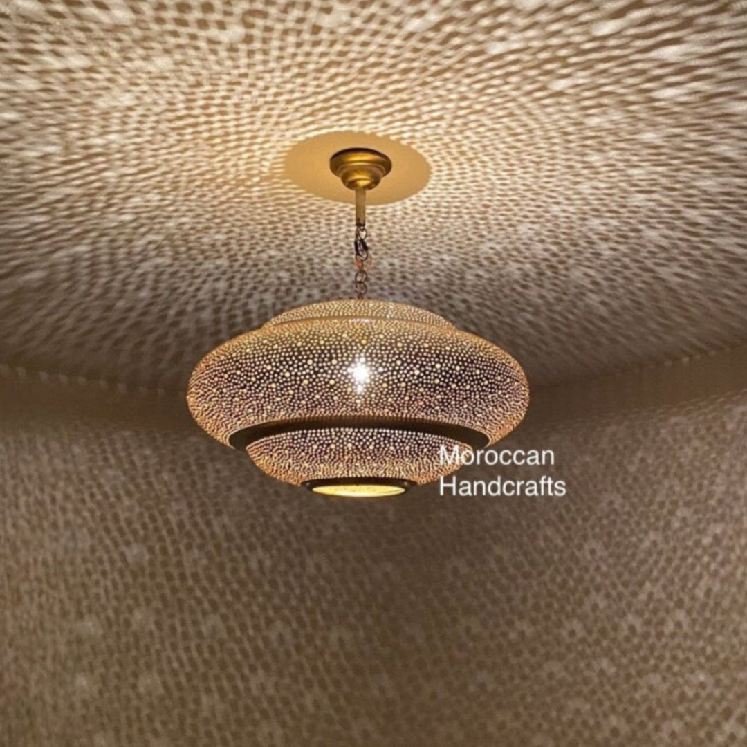Artisan-made Moroccan brass pendant light suitable for modern and bohemian interior design.