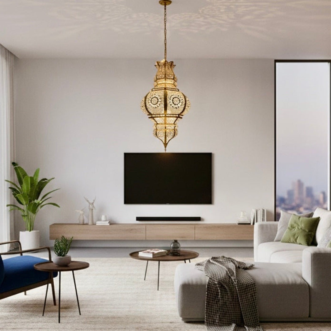 A traditional Moroccan brass chandelier styled in a contemporary minimalist living room with large windows, showing a perfect blend of styles.