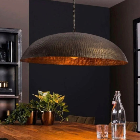 Large handmade Moroccan brass dome lamp with a hammered antique gold finish hanging from a chain.