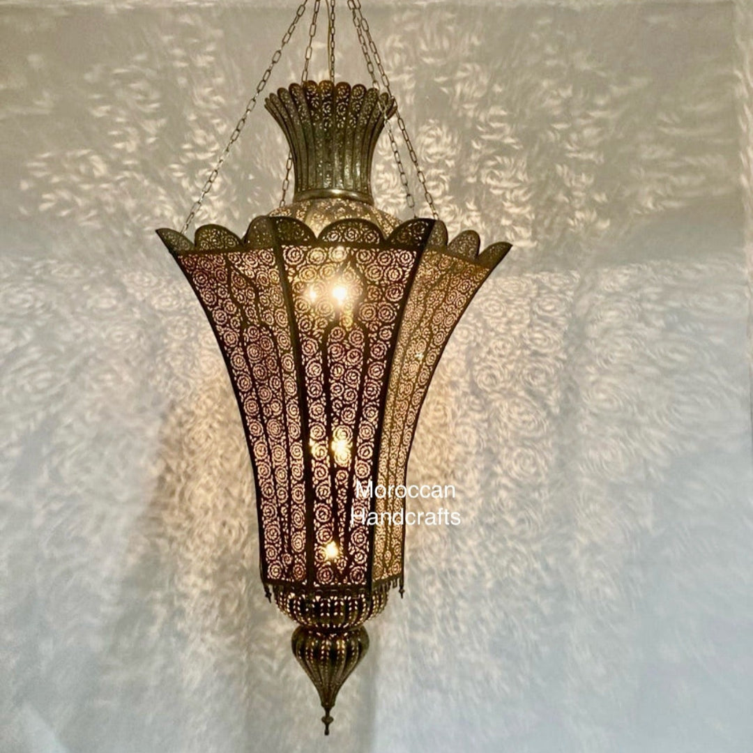 Tiered Moroccan Fanoos chandelier in antique brass with hand-chiseled filigree details, showcasing its impressive size.