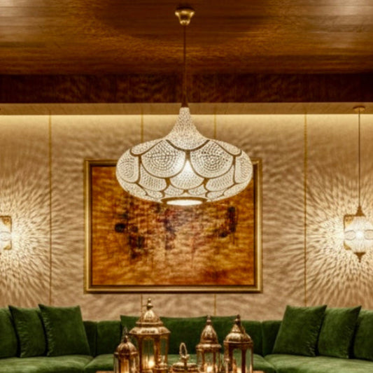 Handmade Moroccan brass ceiling lamp casting intricate shadow patterns in a warm bohemian bedroom setting.