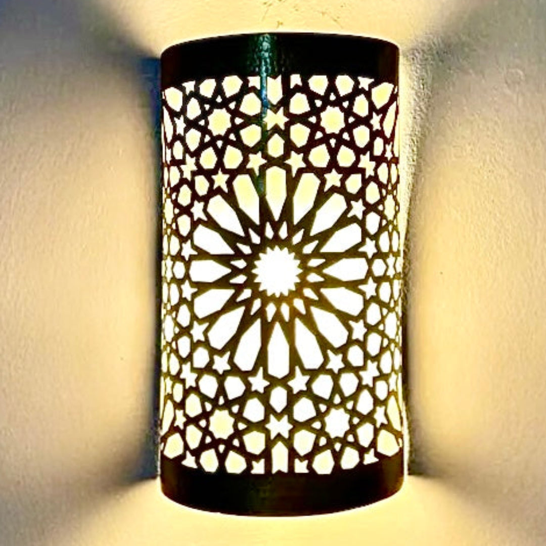 Traditional Moroccan brass wall light with a detailed 8-pointed star filigree design, showcasing authentic North African craftsmanship.