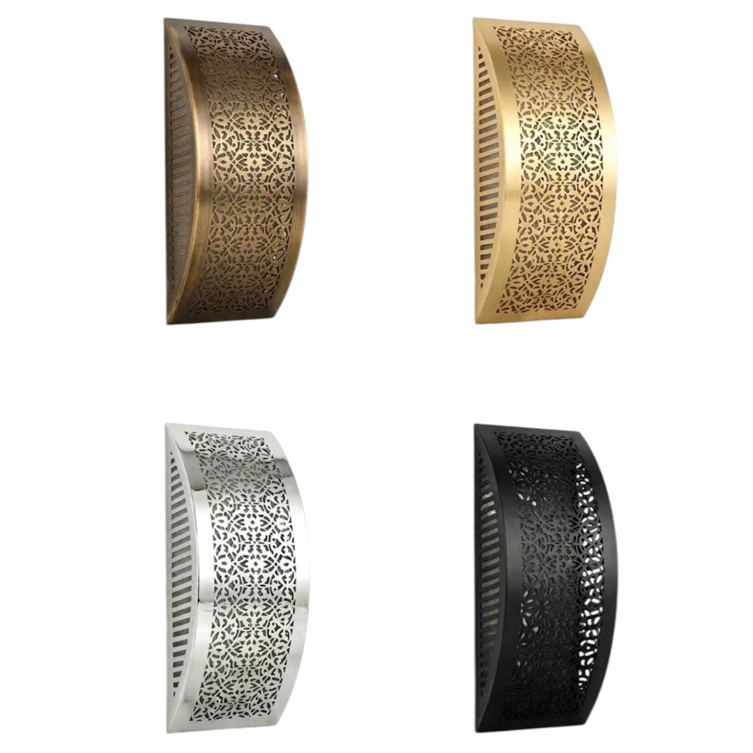 Handmade Moroccan brass wall sconces with intricate perforated floral patterns in four finishes: antique brass, gold, silver, and matte black.