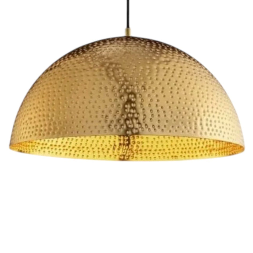 Handcrafted Moroccan dome pendant light in hammered brass finish, minimalist modern design for luxury interiors.