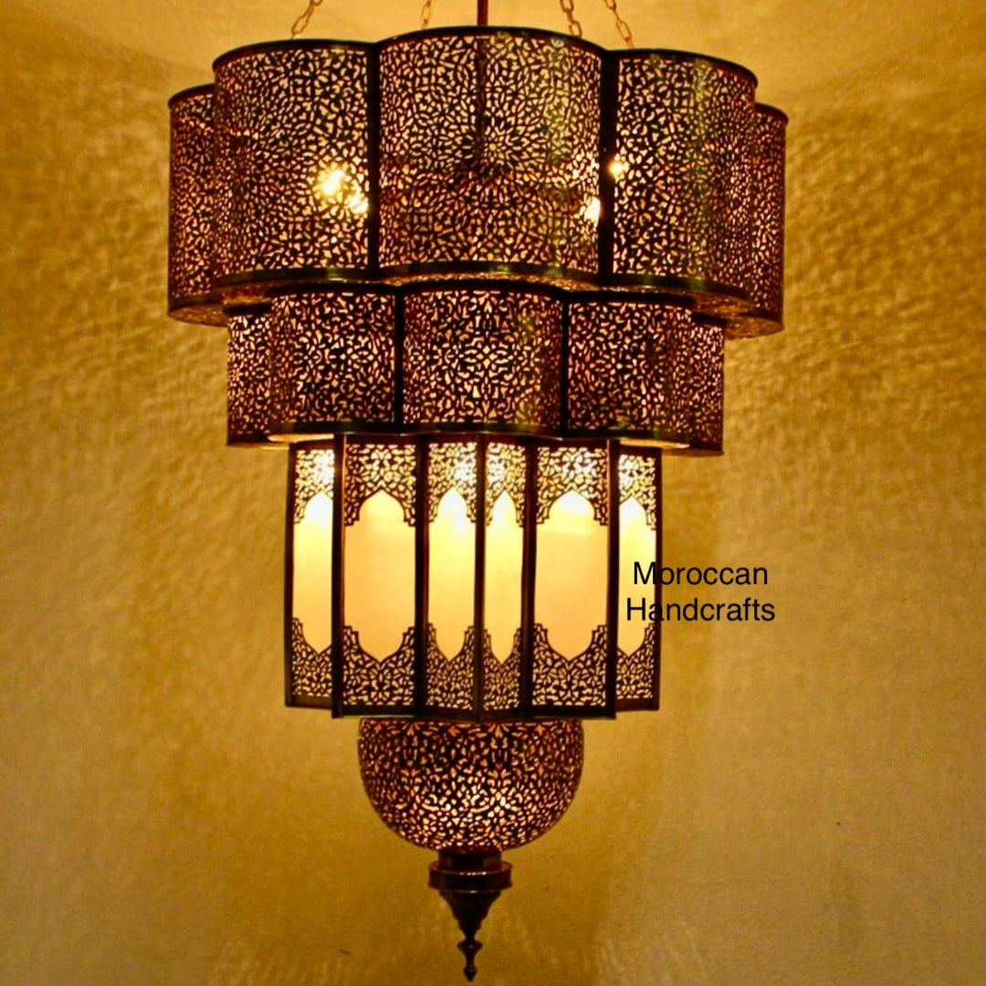 Detailed view of the lamp's intricate brass geometric metalwork and multi-level structure.