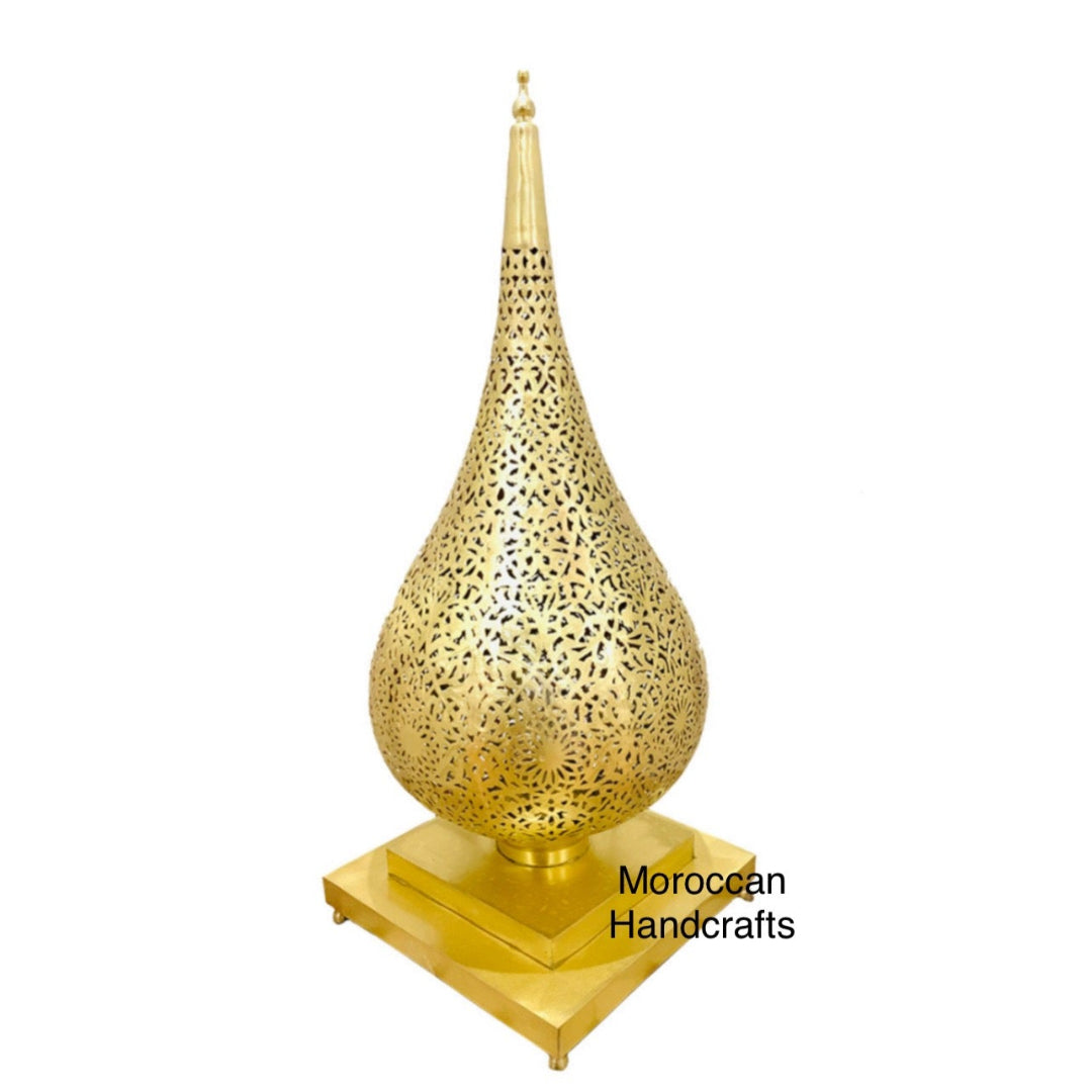 Close-up of a glowing oriental-style henna lantern, perfect for exotic table decor and ambiance.